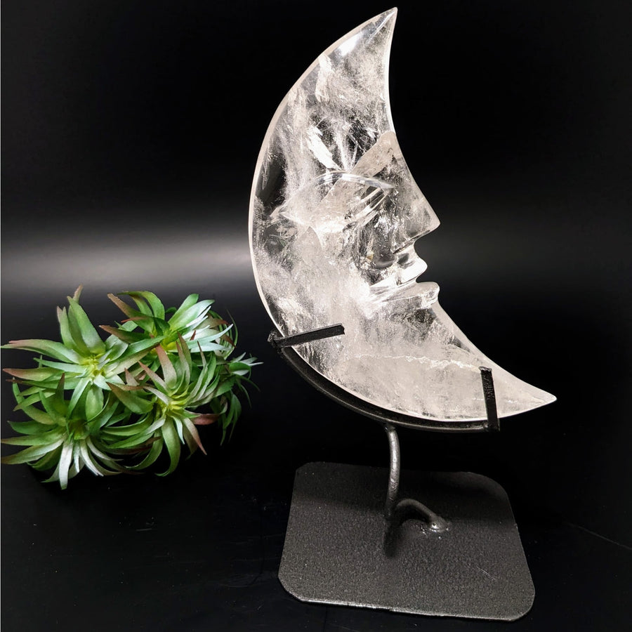 Clear quartz 7-inch crescent moon carving with face on stand LV4403MC