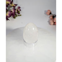 Translucent white clear quartz egg 1.5x1.75in #BC0468 on glass stand