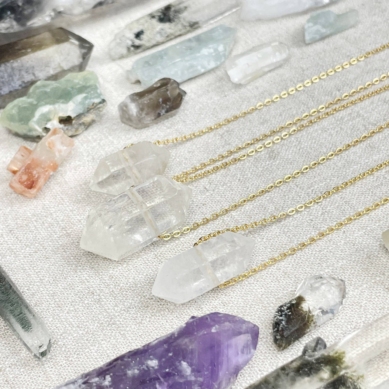 Clear quartz double terminated point pendant on 18-inch gold chain #LV9389