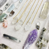 Clear quartz double terminated point pendant on 18-inch gold chain #LV9389