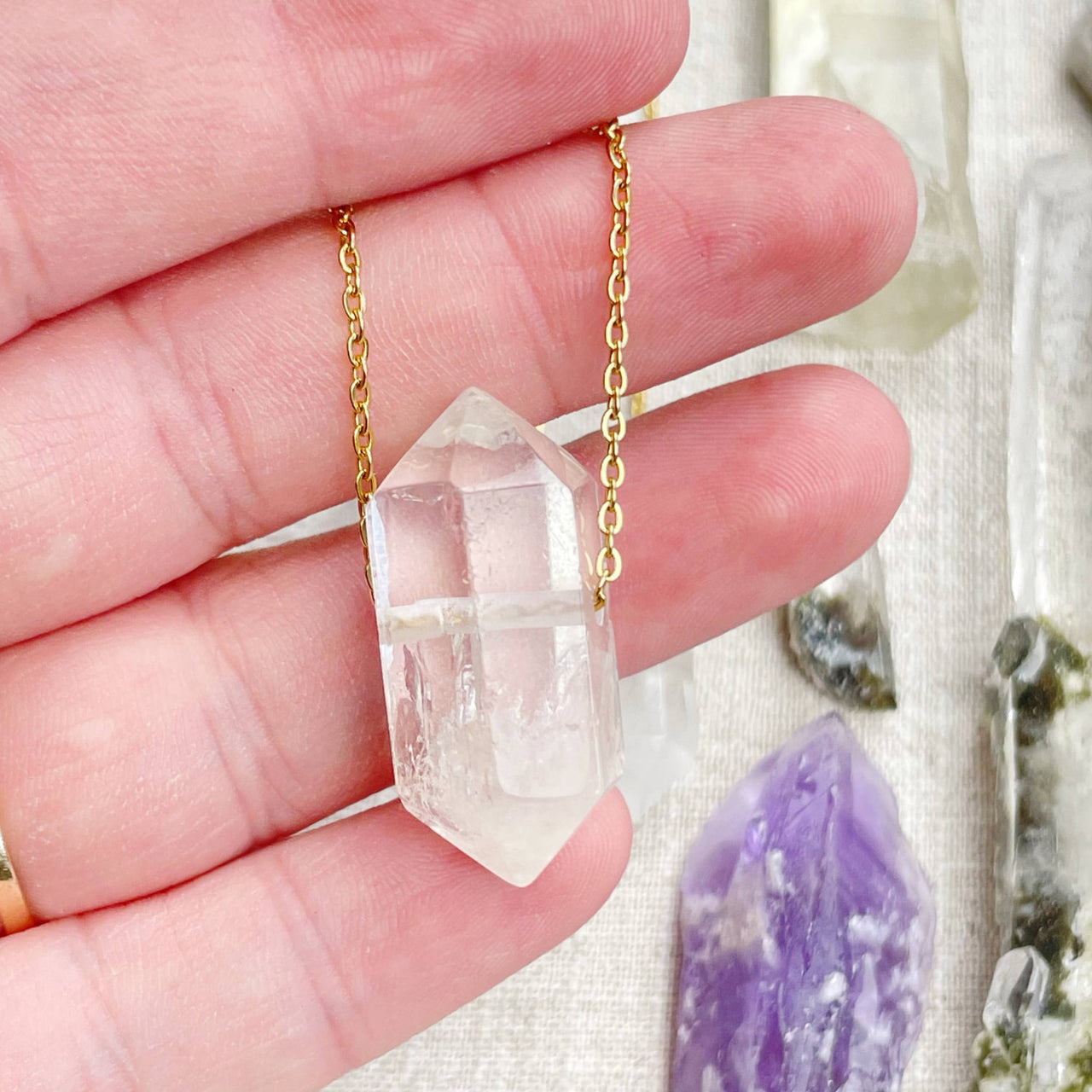 Clear quartz double terminated point pendant on 18’’ gold chain LV9389