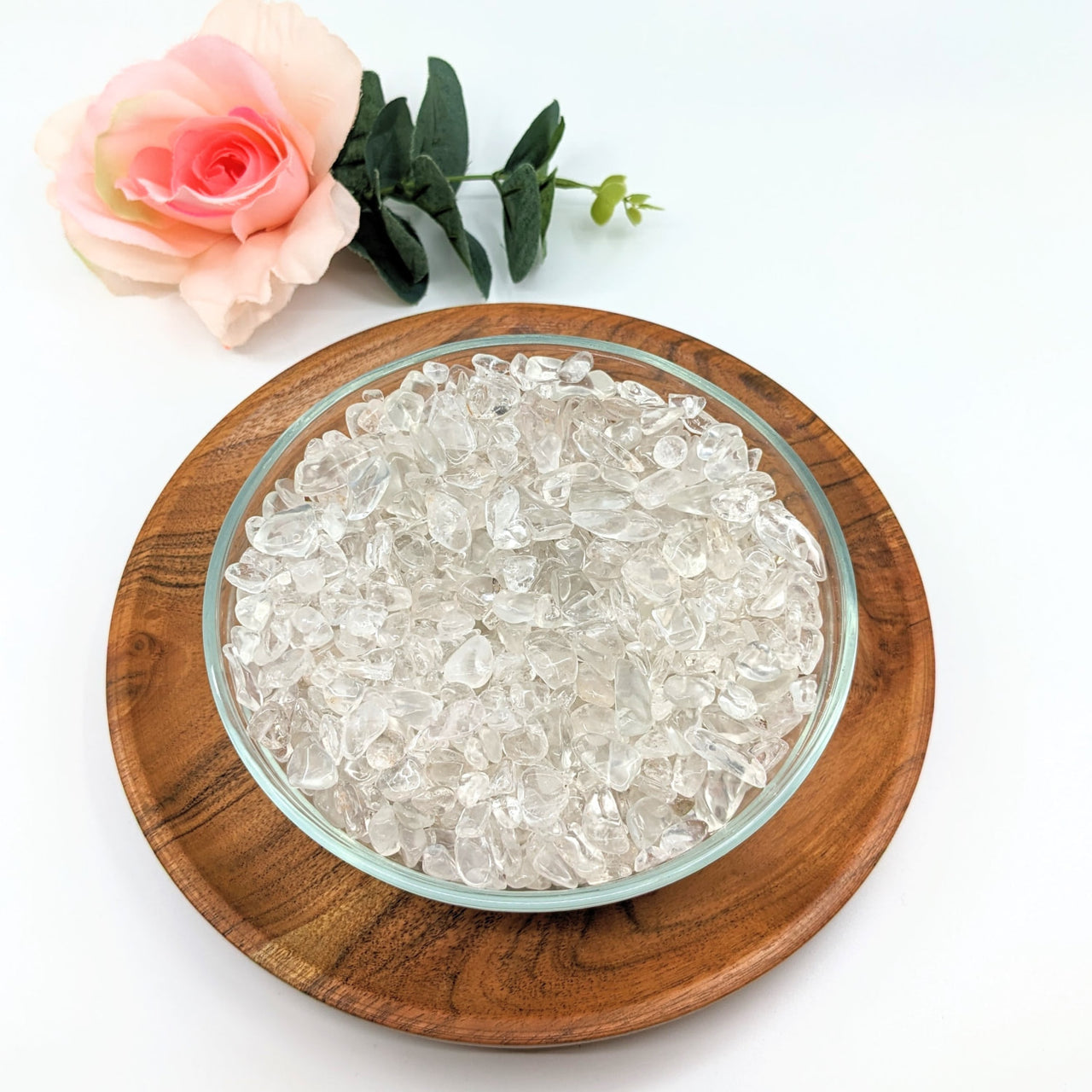 Bowl of crushed ice on wooden plate showcasing Clear Quartz Gravel Mini Chips 28g #LV3078