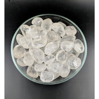 Clear Quartz Tumbled #T037 stones in glass bowl