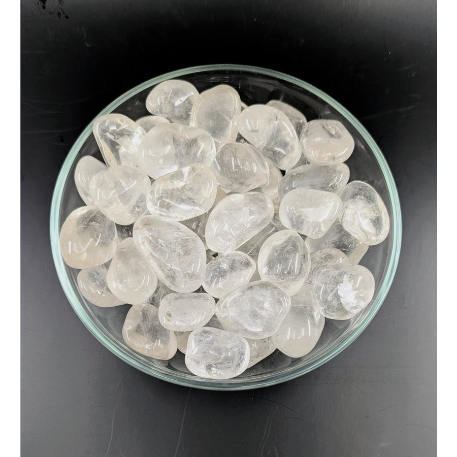 Clear Quartz Tumbled #T037 stones in glass bowl