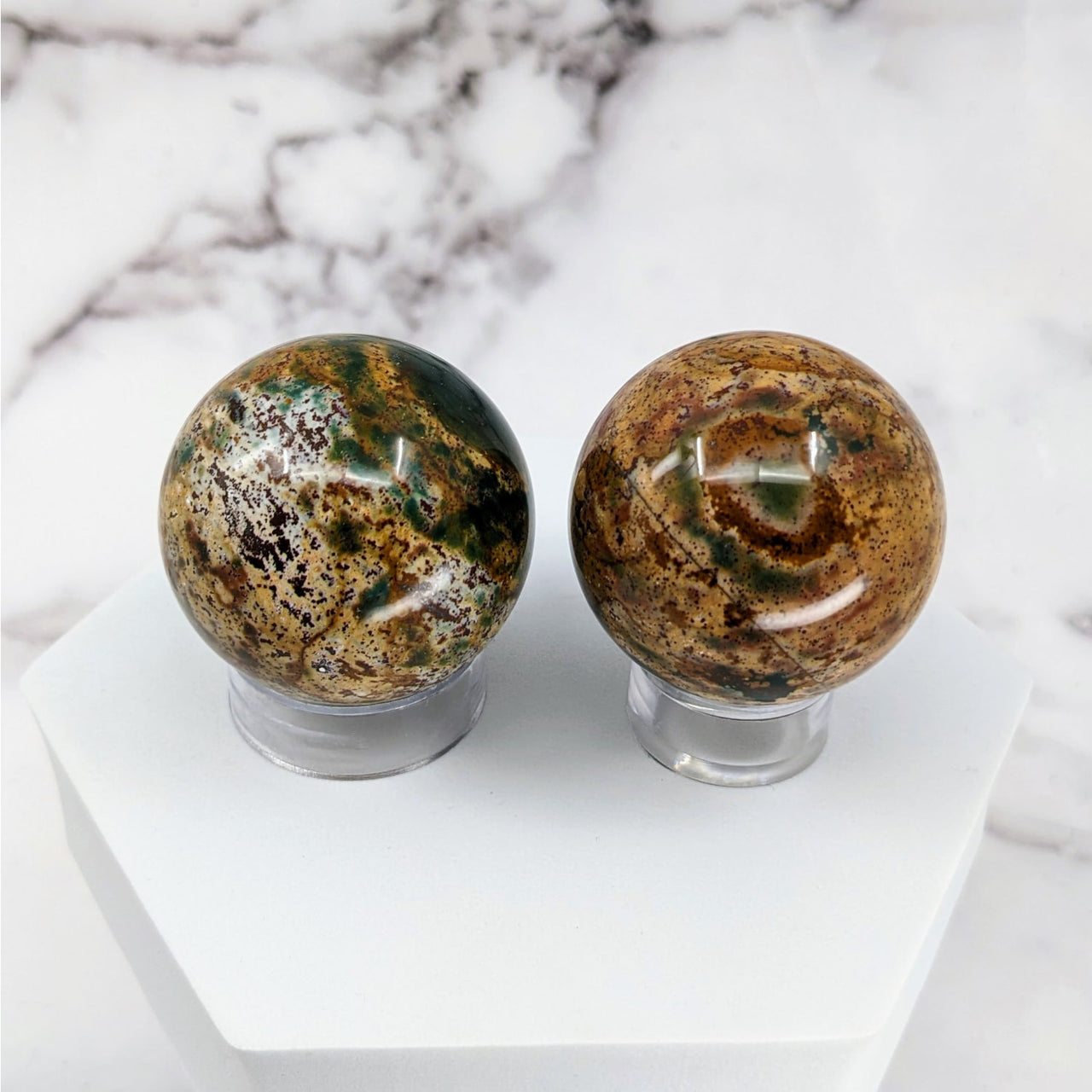 Colorful Bloodstone Sphere #S062: Two glass spheres on a marble base