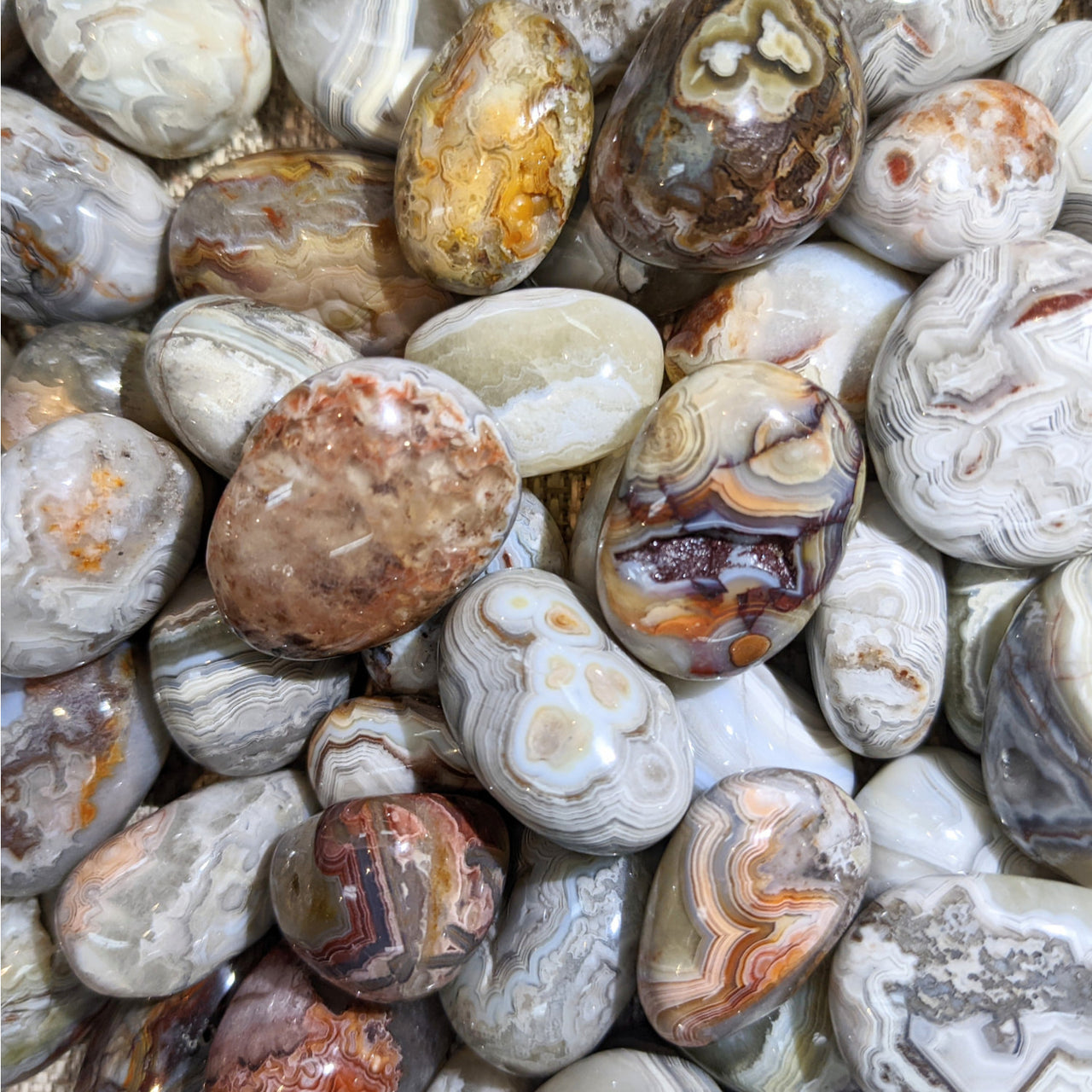 Polished Crazy Lace Agate Tumbled Stone with varied patterns for jewelry and collection