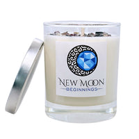 New Moon Beginnings soy crystal ritual candle in glass jar with stones