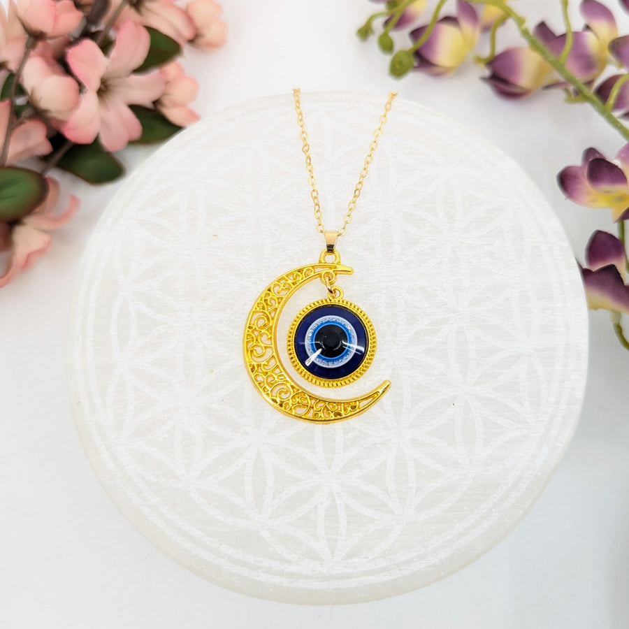 Gold crescent moon necklace with evil eye pendant, 20-inch chain, luxurious jewelry