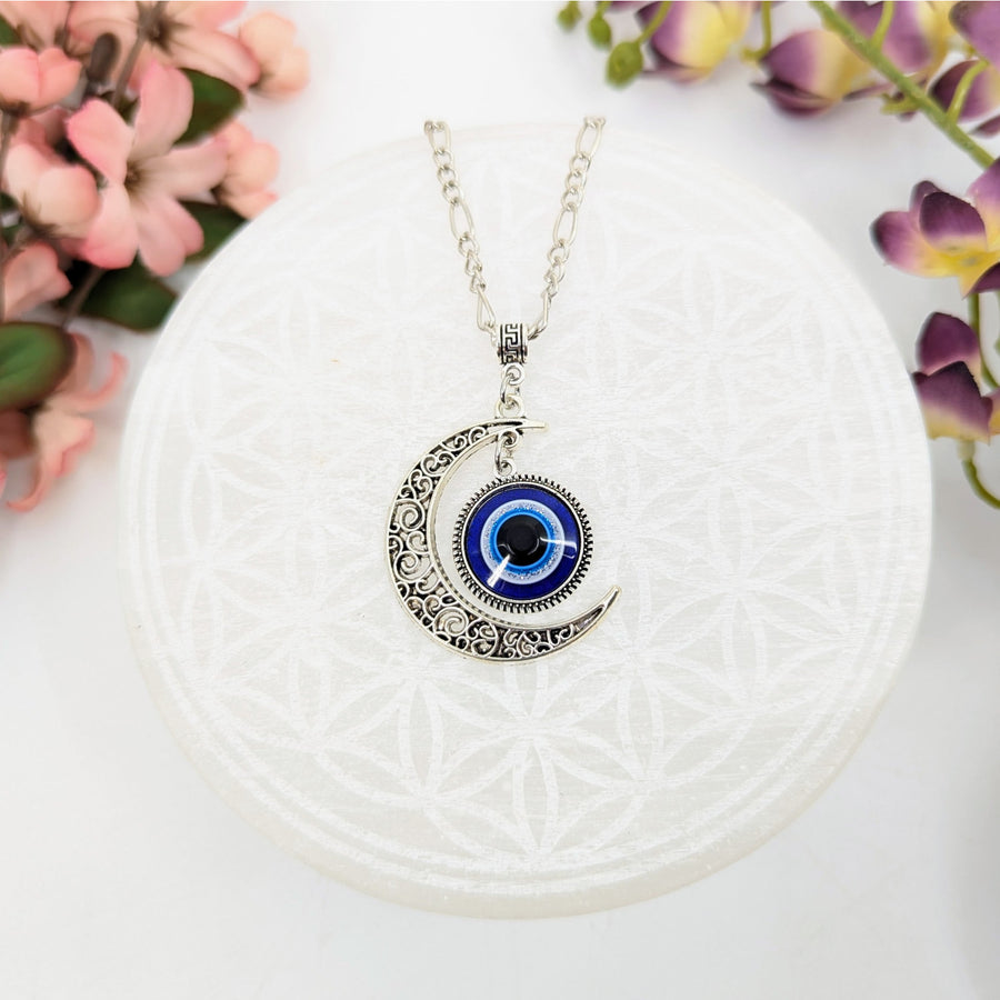 Silver crescent moon evil eye necklace displayed in the Crescent Moon 20 Silver Evil Eye Necklace #LV8706