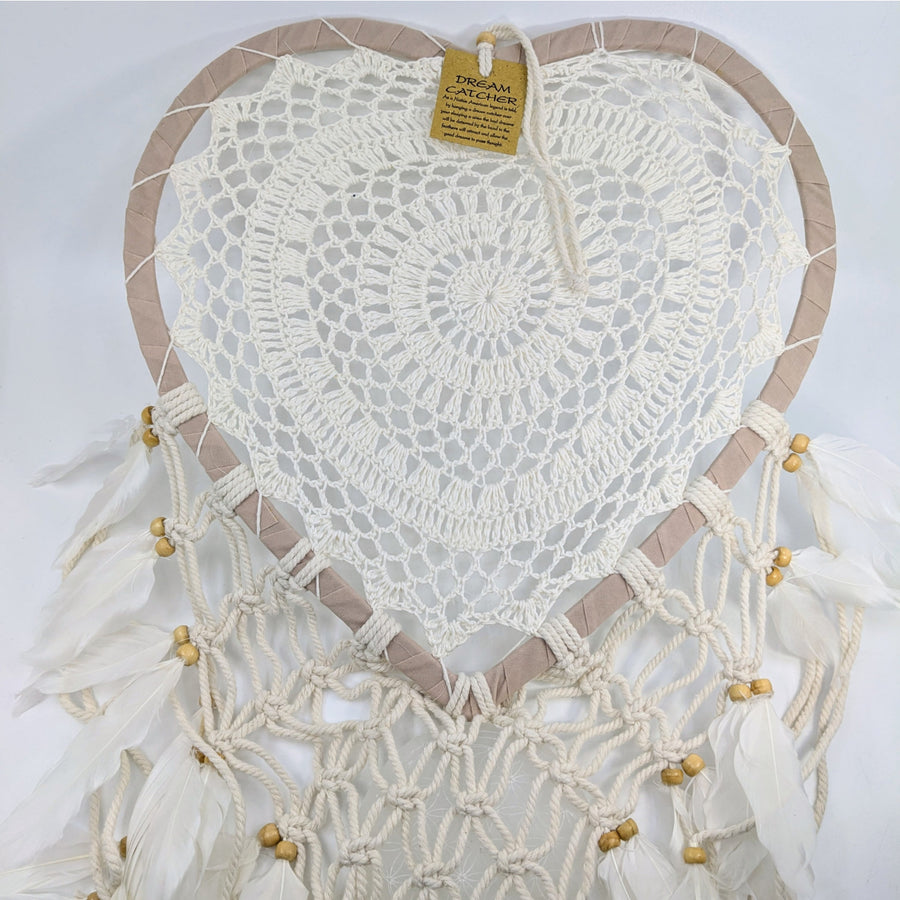 Heart-shaped white lace crochet heart dreamcatcher with gold beads and tassels