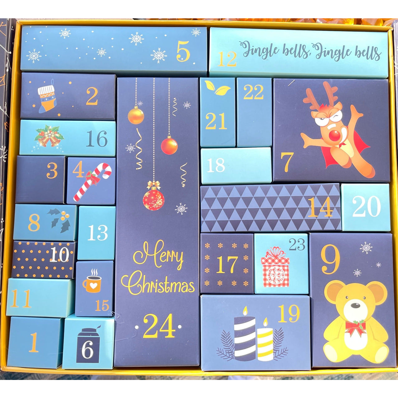 Blue and gold Advent Calendar featuring 24 days of crystals, jewelry, and self-care