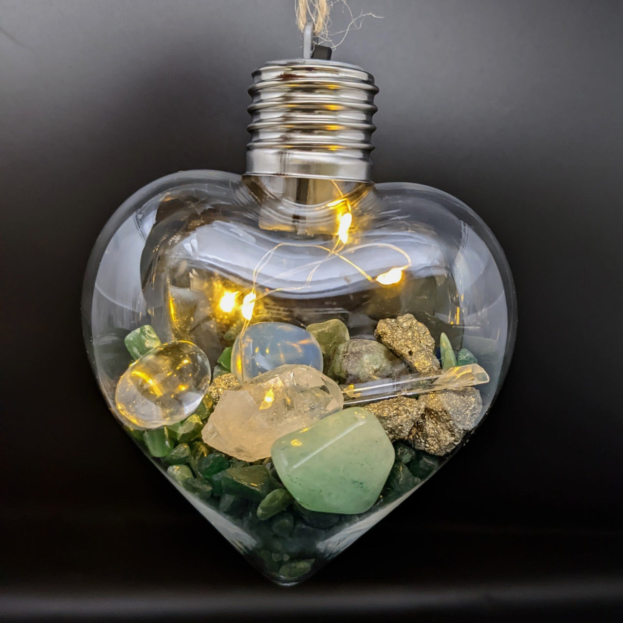 Heart-shaped glass light bulb with crystals in Crystal Heart Ornament with Lights