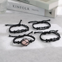 Thumbnail for Four black braided string bracelets with a pink crystal from the Crystal Holder Necklace