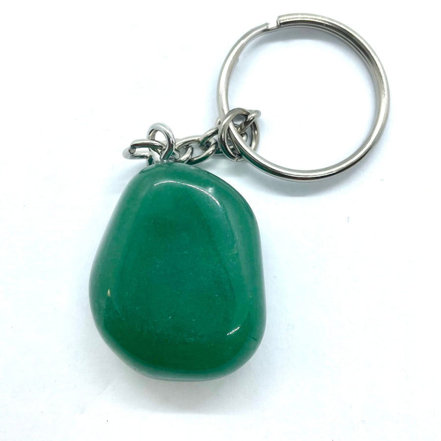 A smooth polished green aventurine crystal keychain with a silver metal ring and chain for easy carrying