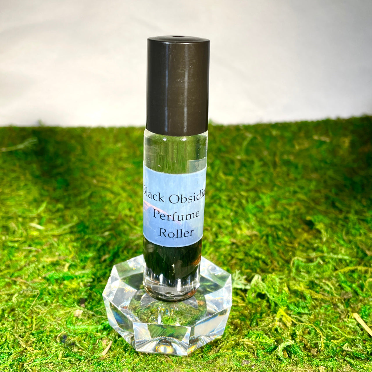 Crystal Perfume 10ml Roller #Q217 on green grass