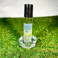 Thumbnail for Crystal Perfume 10ml Roller #Q217 bottle on green grass, elegant and refreshing scent