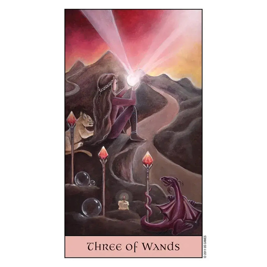 A cloaked figure on a mountain path with glowing crystal wands in Crystal Visions Tarot