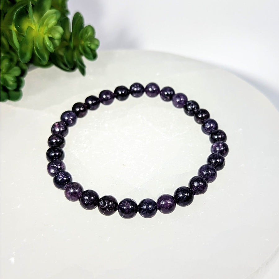 Dark Lepidolite 7-inch beaded bracelet with polished speckled texture