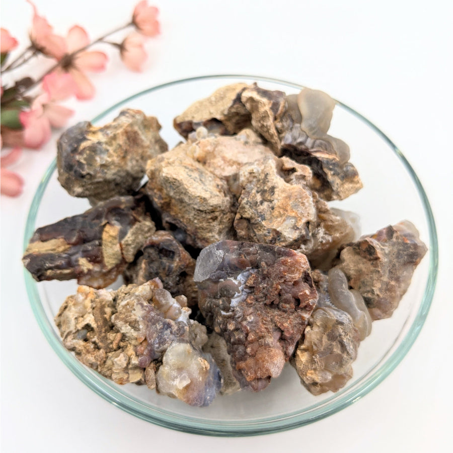 Deer Creek Fire Agate mixed size rough rocks in clear bowl, 1.5-6 inches