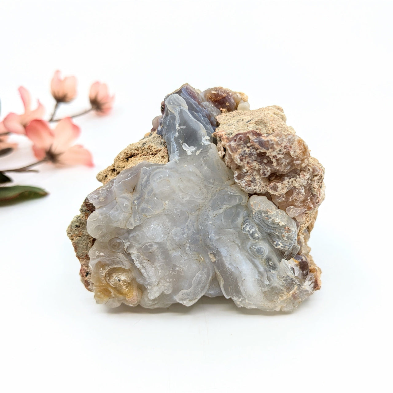 Translucent gray Deer Creek Fire Agate geode with layered patterns, 1.5-6 inch rough mixed sizes