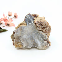 Translucent gray Deer Creek Fire Agate geode with layered patterns, 1.5-6 inch rough mixed sizes
