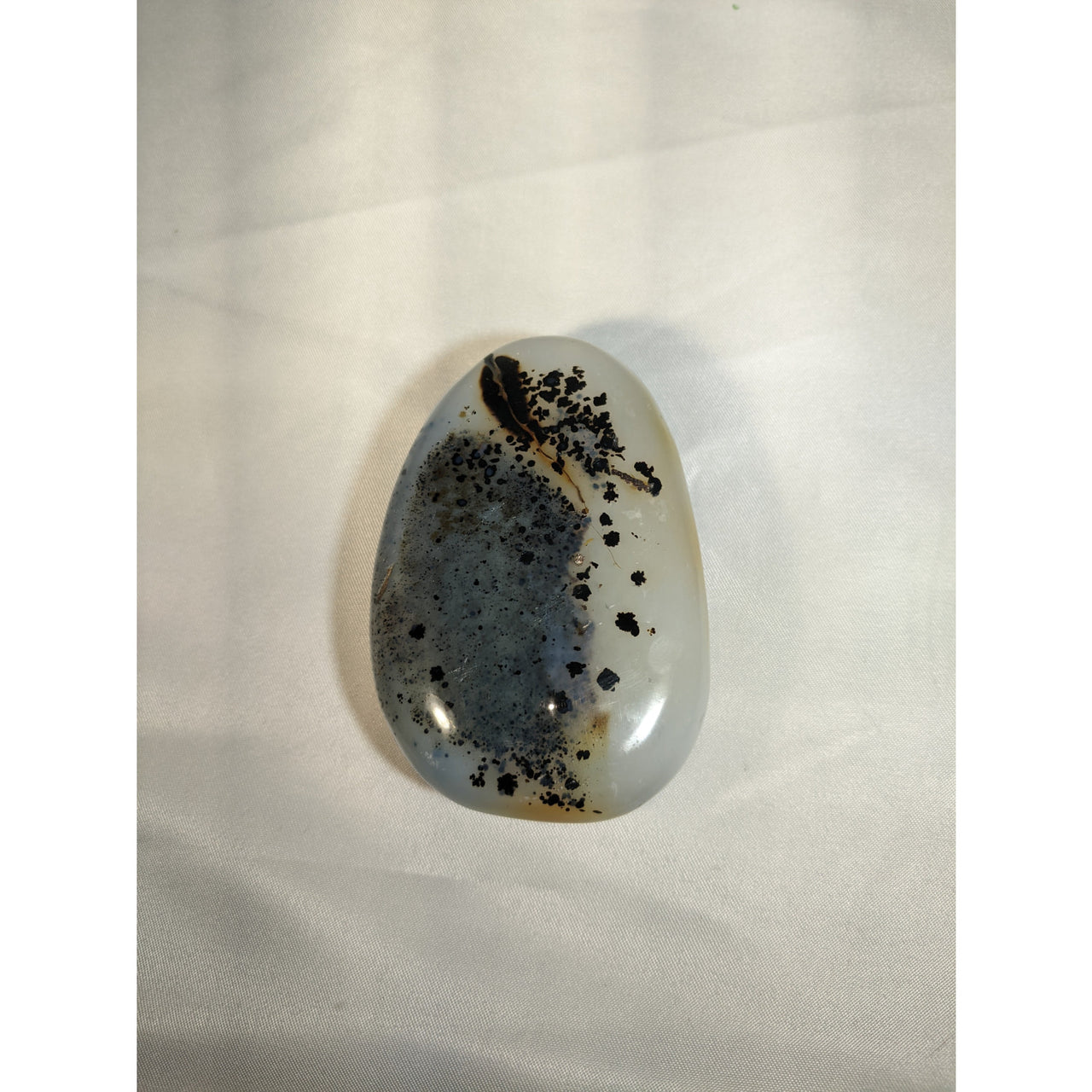 Smooth grey Dendrite Agate polished pebble with black mineral inclusions, 105g