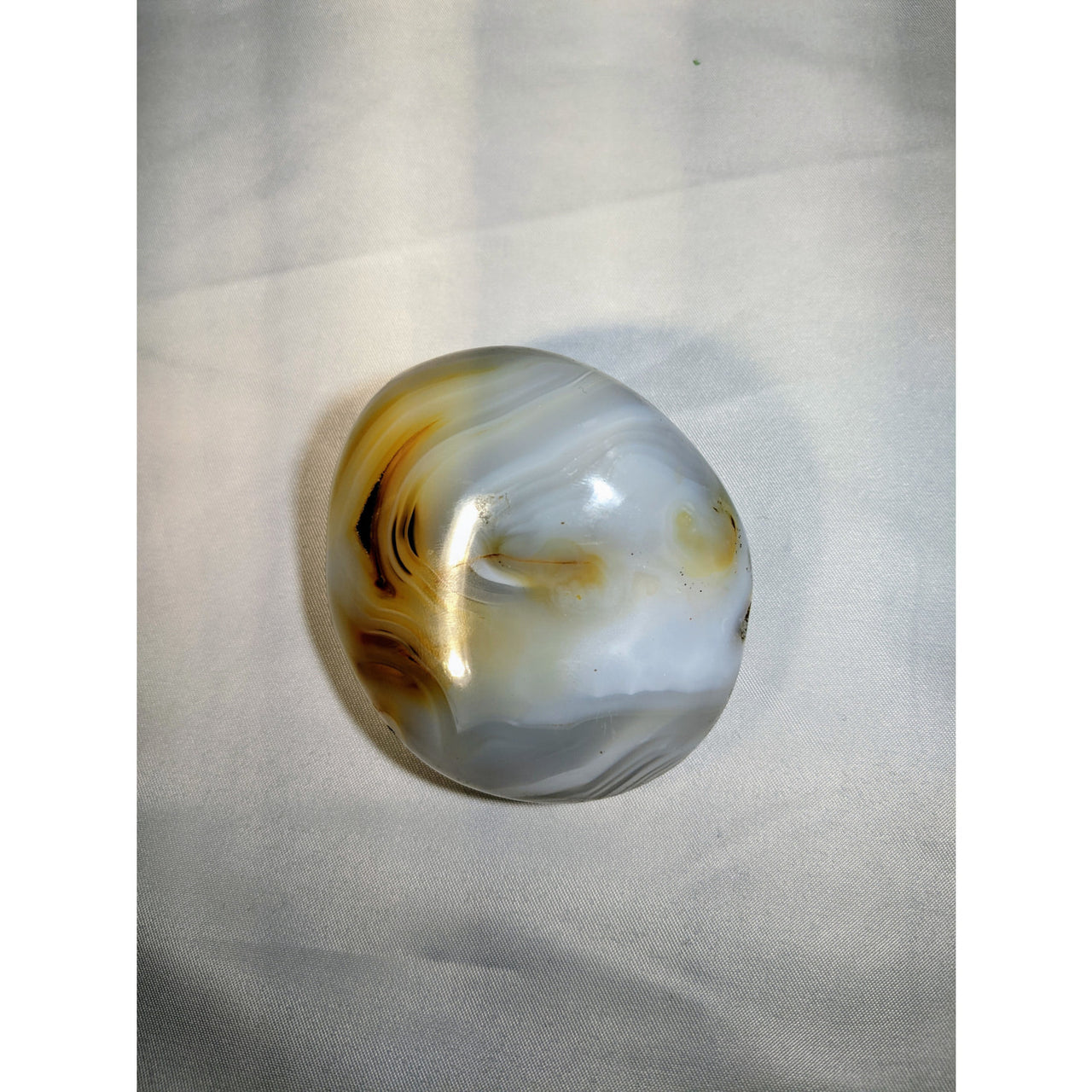 Swirled white and amber Dendrite Agate Polished Pebble in product #LV0971