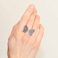 Thumbnail for Elegant woman’s hand wearing a dimensional butterfly wings sterling silver ring #J028