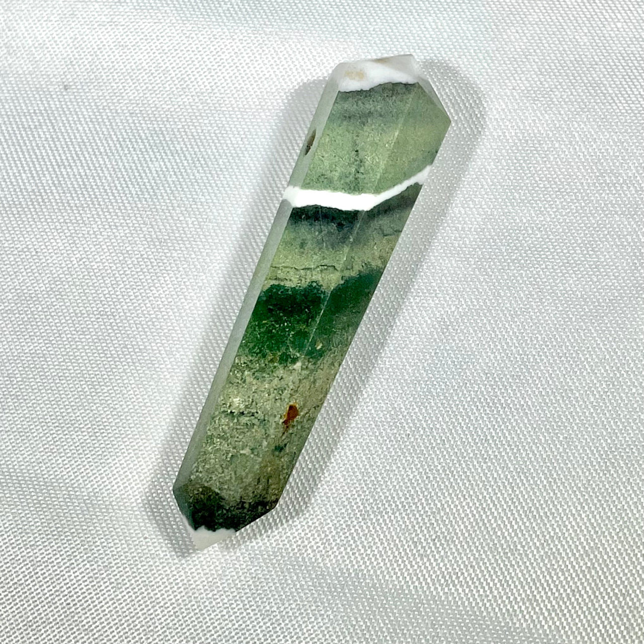 Green tourmaline double terminated crystal pendant showcasing color zoning bands