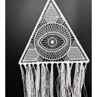 White crocheted triangular wall hanging with eye motif and lace tassels dreamcatcher 10 inch triangle white lace