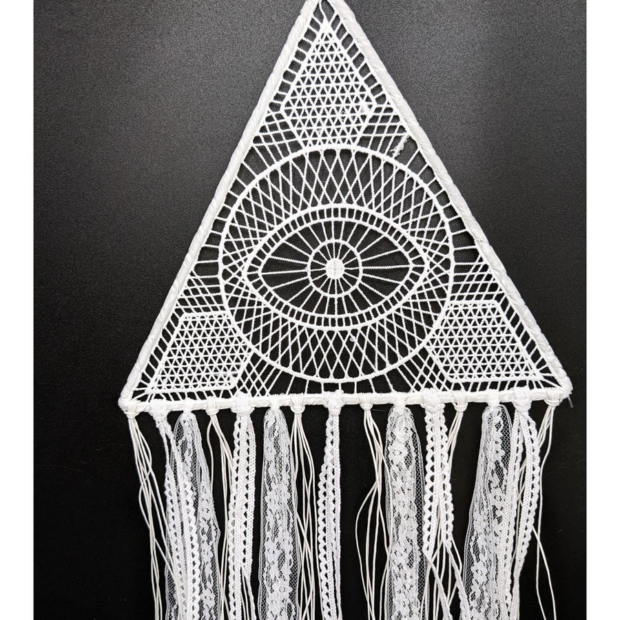 White crocheted triangular wall hanging with eye motif and lace tassels dreamcatcher 10 inch triangle white lace