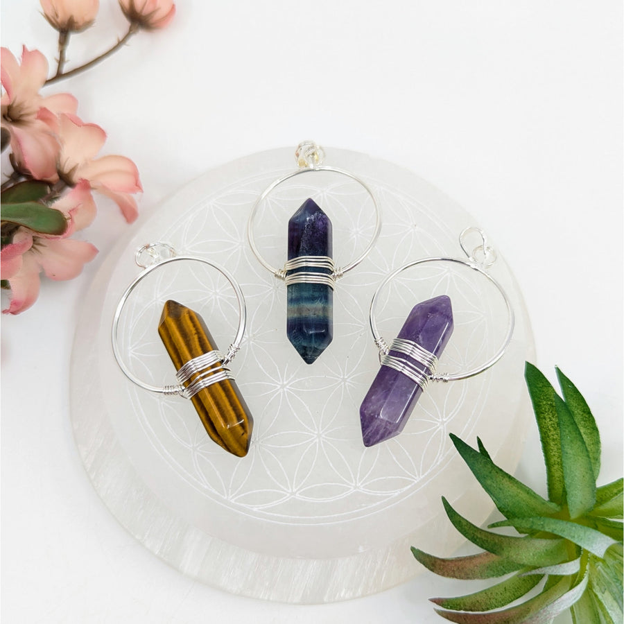 Handcrafted crystal healing gemstone pendant with silver wire wrapping from Bliss Crystals