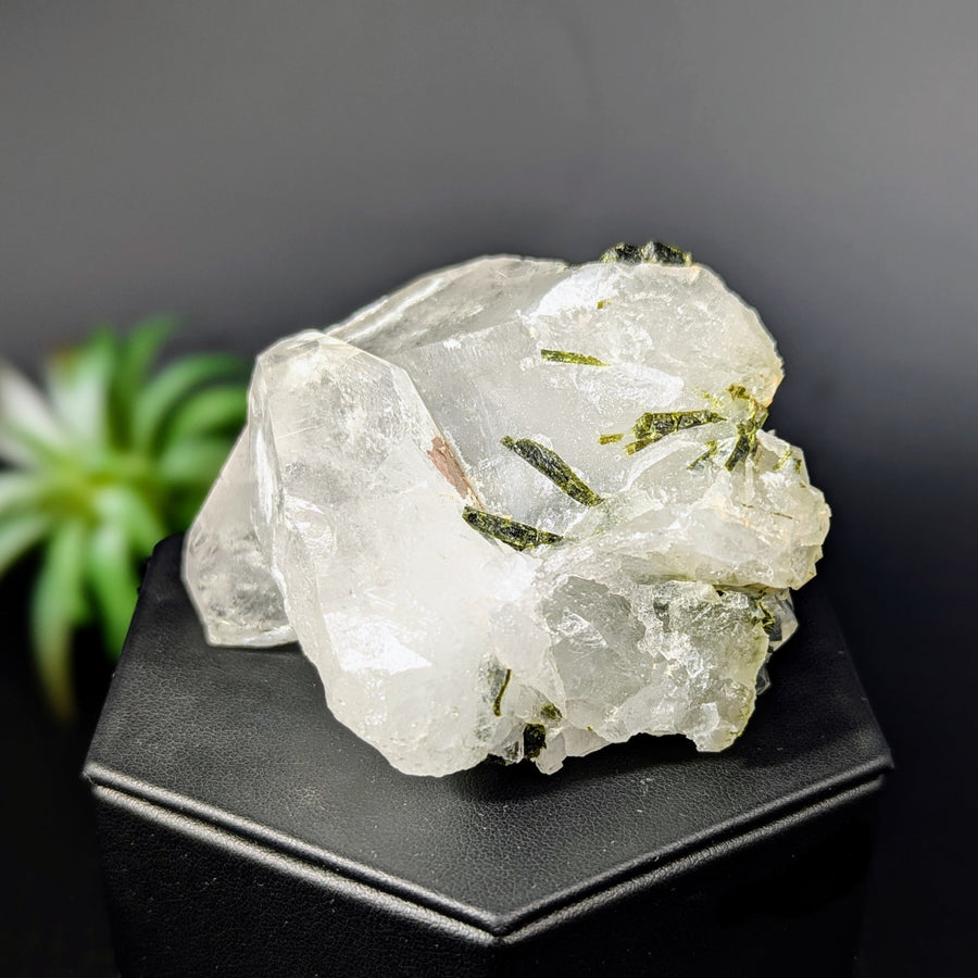 Clear quartz crystal with green Tourmaline inclusions in Epidote in Quartz cluster