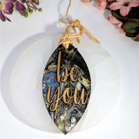 Be You Etched 6-inch resin crystal hanging ornament with marbled leaf design