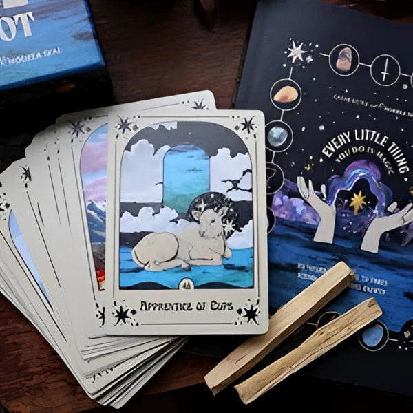 Tarot card deck with mystical cat art, featured in Every Little Thing You Do Is Magic Workbook