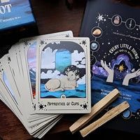 Tarot card deck with mystical cat art, featured in Every Little Thing You Do Is Magic Workbook