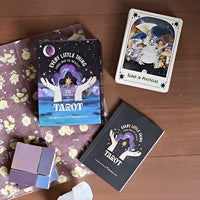 Tarot card deck cover featuring mystical moon and ocean for Every Little Thing You Do Is Magic Workbook