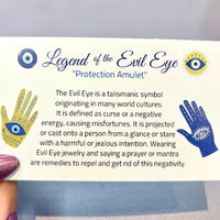Thumbnail for A hand holding a card with ’Legend of the Eye’ from the EVIL EYE INFO CARD, Double Sided #HC376