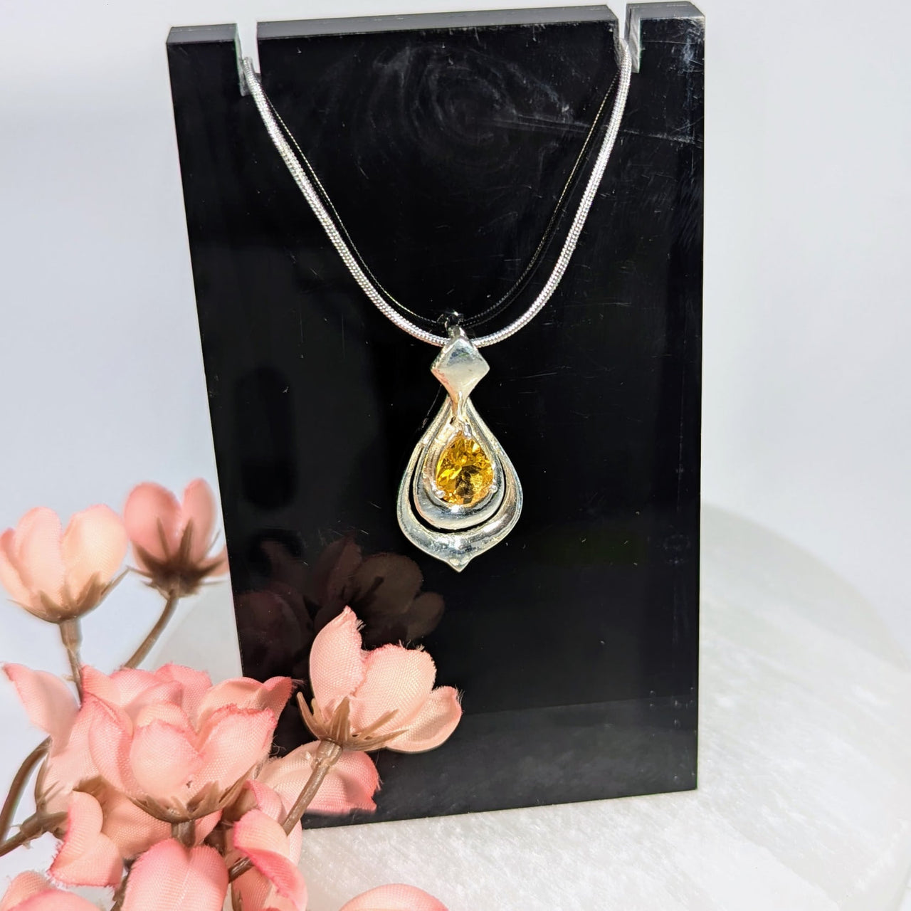 Elegant silver teardrop pendant with faceted citrine gemstone #BC0172