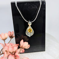 Elegant silver teardrop pendant with faceted citrine gemstone #BC0172