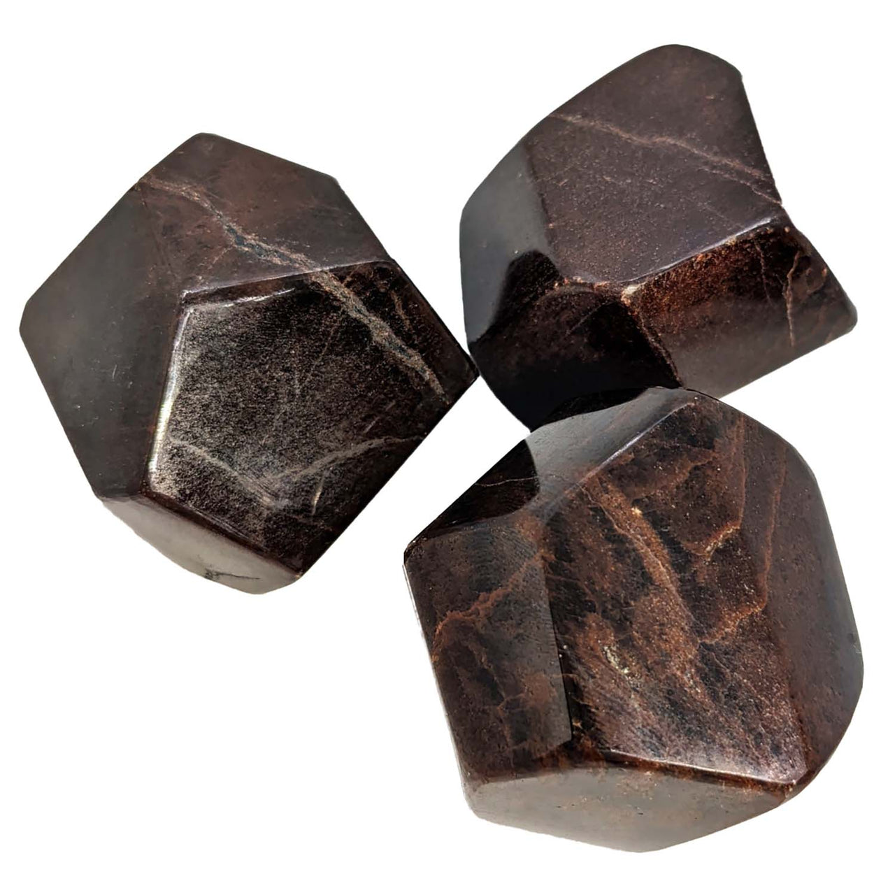 Three brown marble dices on a white background for Garnet Polygon Polished #SK8089