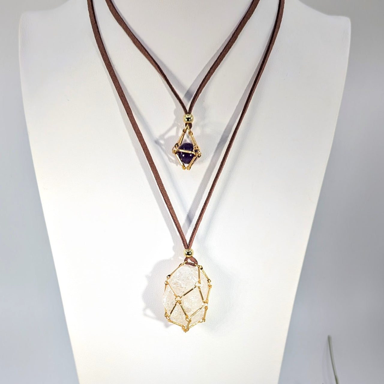 Faux suede 32’’ adjustable necklace with gold geometric cage holding quartz & amethyst #BC1069