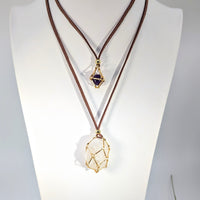 Faux suede 32’’ adjustable necklace with gold geometric cage holding quartz & amethyst #BC1069