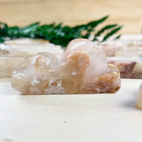 Translucent peach Flower Agate Cloud Carving LV9390 with swirls