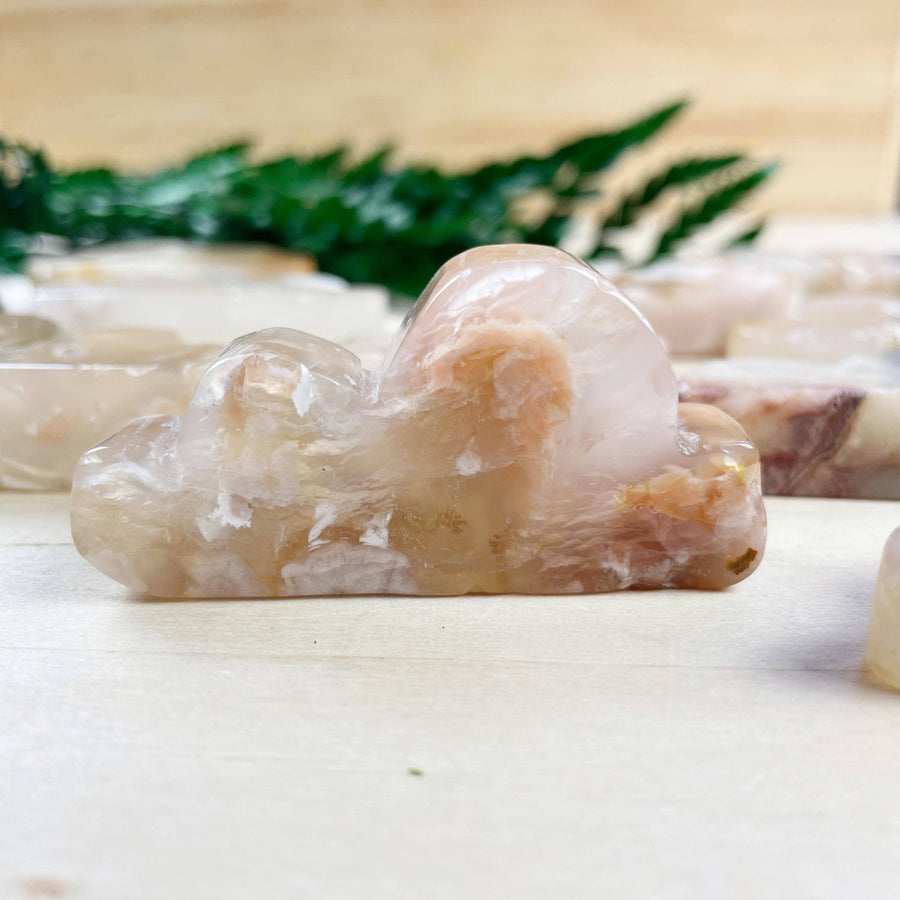 Translucent peach Flower Agate Cloud Carving LV9390 with swirls