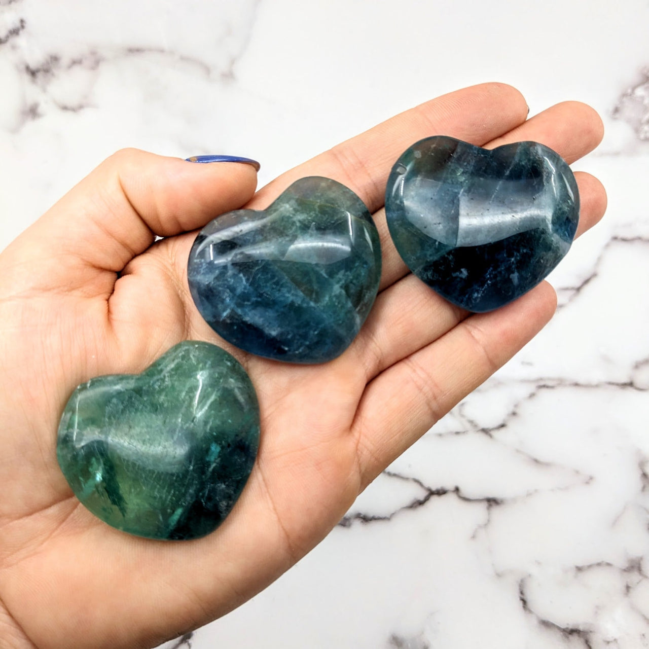 Two green heart-shaped Fluorite stones, 1.7’ polished, product code LV1816