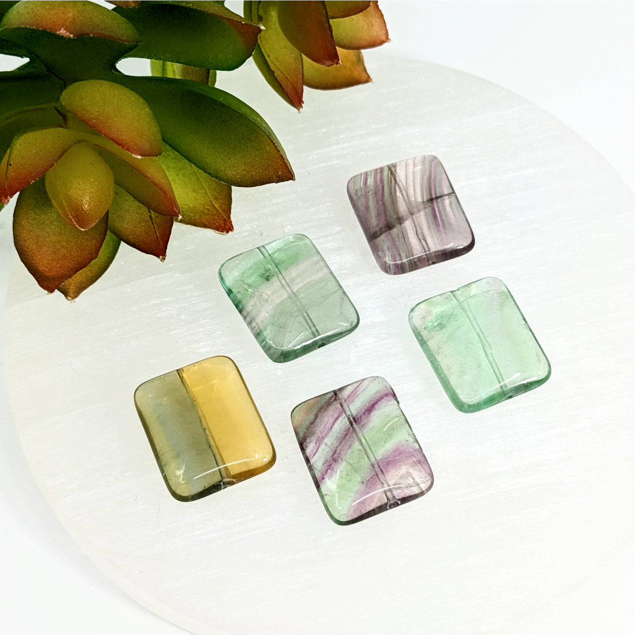 Colorful fluorite 22mm flat rectangle bead with mint green, yellow, and purple swirls