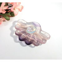 Purple and clear crystal fluorite shell bowl for decorative or spiritual use