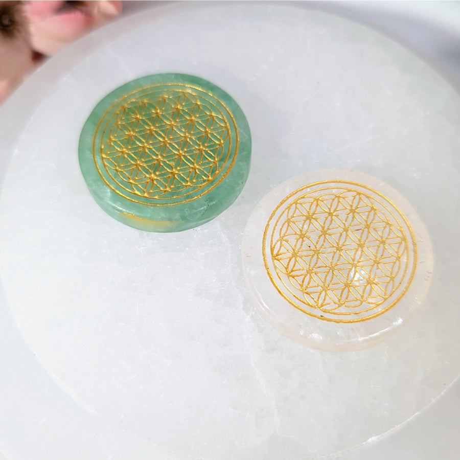 Two translucent fluorite quartz 1.3’’ flower of life etched pendants