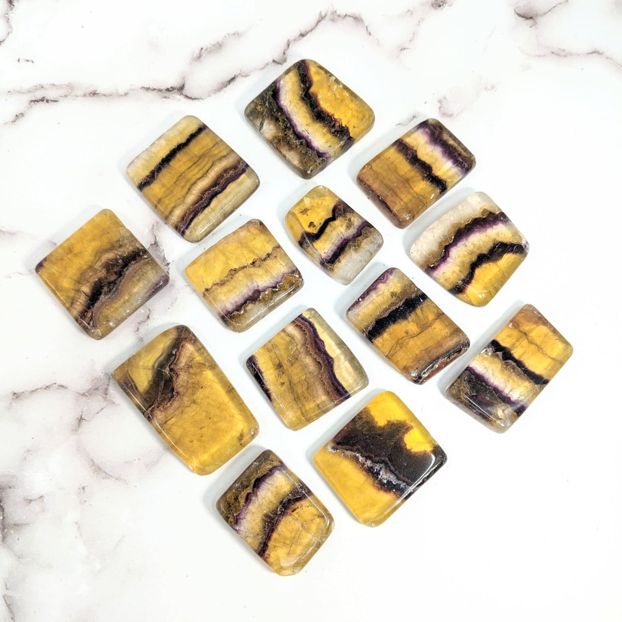 Six yellow and black marble blocks, flat shape, Fluorite Yellow Grade A Slice